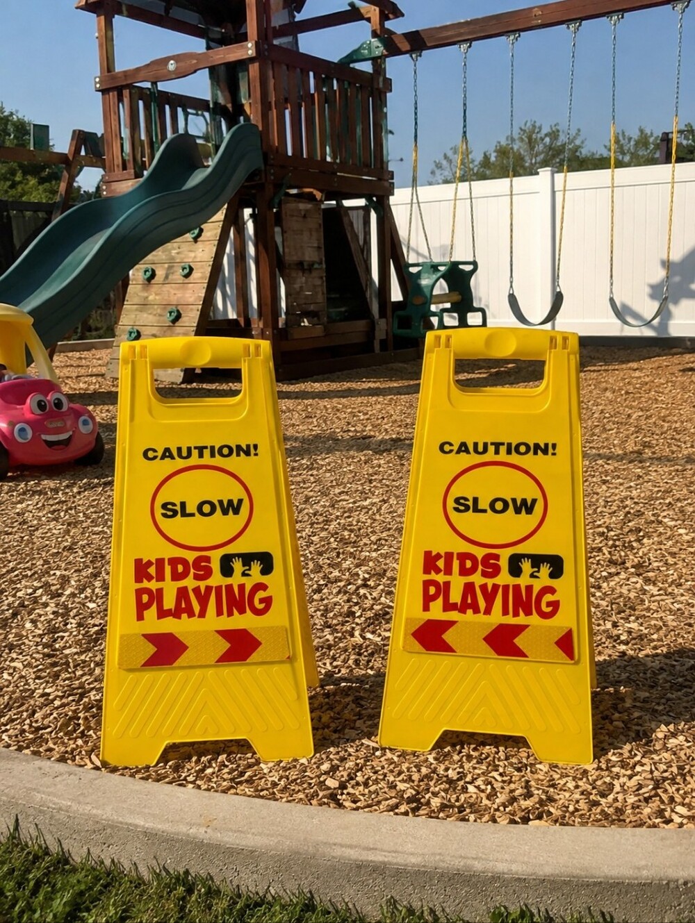 Set of 2 bright yellow “Caution! Slow Kids Playing" Signs Reflective Safety